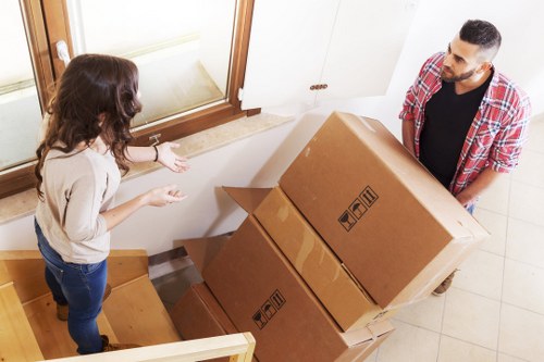Office relocation equipment and boxes prepared for transport